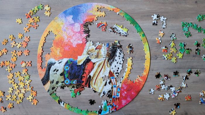500 piece round jigsaw indigenous puzzle by John Balloue Canada