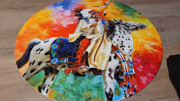 500 piece round jigsaw indigenous puzzle by John Balloue Canada