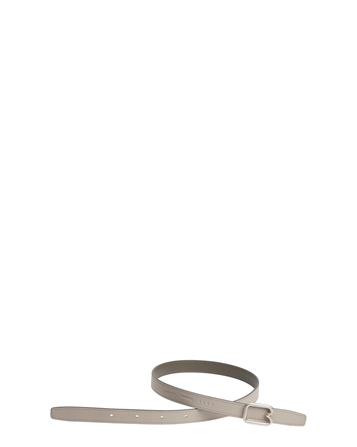 A reversible BOYY calfskin leather belt, one side kalamata and the other gres, featuring a removable signature brass B-shaped buckle