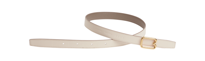 A reversible BOYY calfskin leather belt, one side linen and the other walnut, featuring a removable signature brass B-shaped buckle