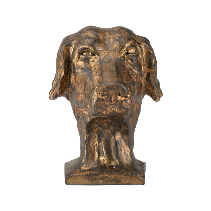 Bronze statue of a dog's head on a white background