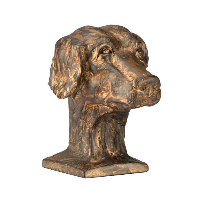 Bronze sculpture of a dog's head on a white background