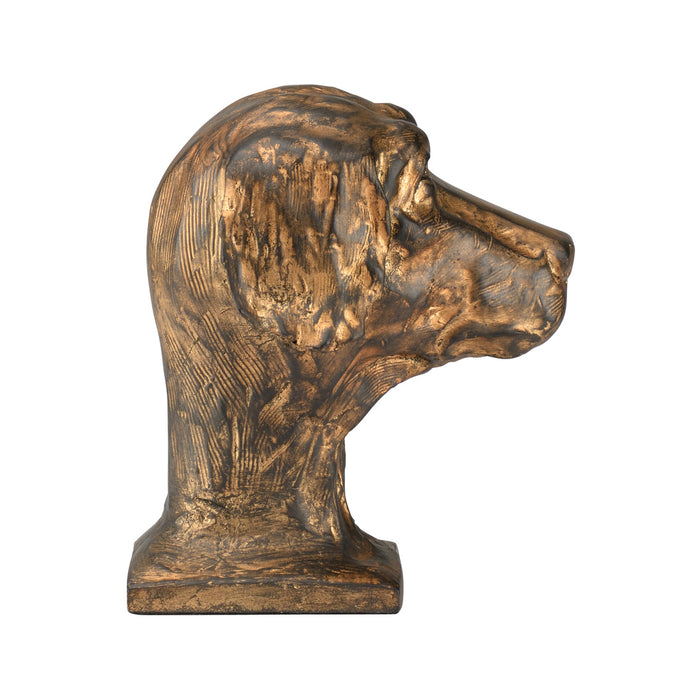 Bronze sculpture of a dog's head on a white background