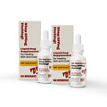 Two bottles and two boxes of Oh Norman! Stop Effing Itching! liquid dog supplement with Vet Approved badge