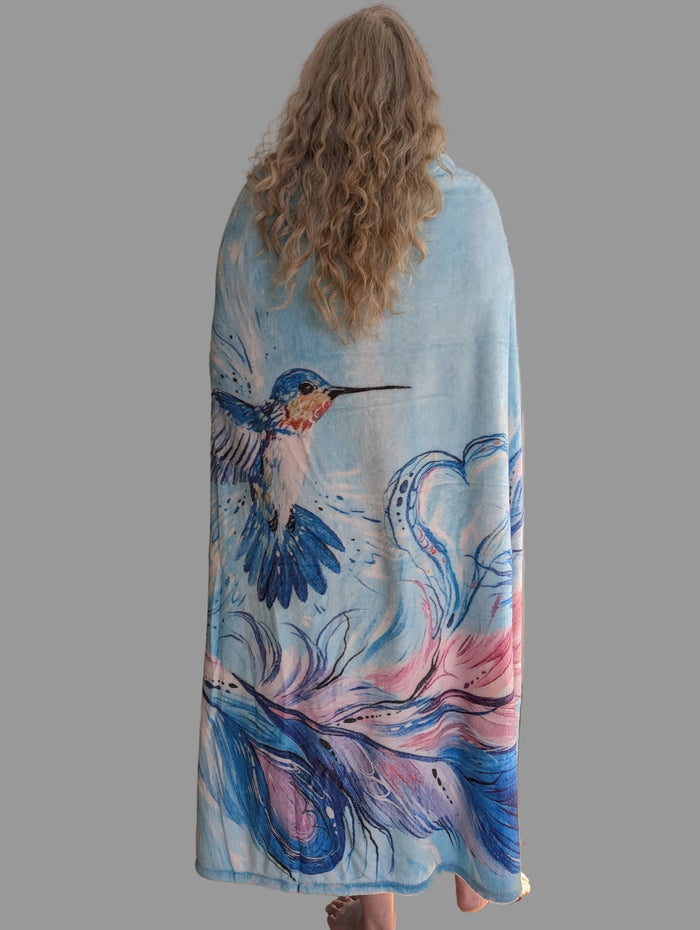"Hummingbird Feathers" fleece blanket, artwork by Metis artist, Carla Joseph