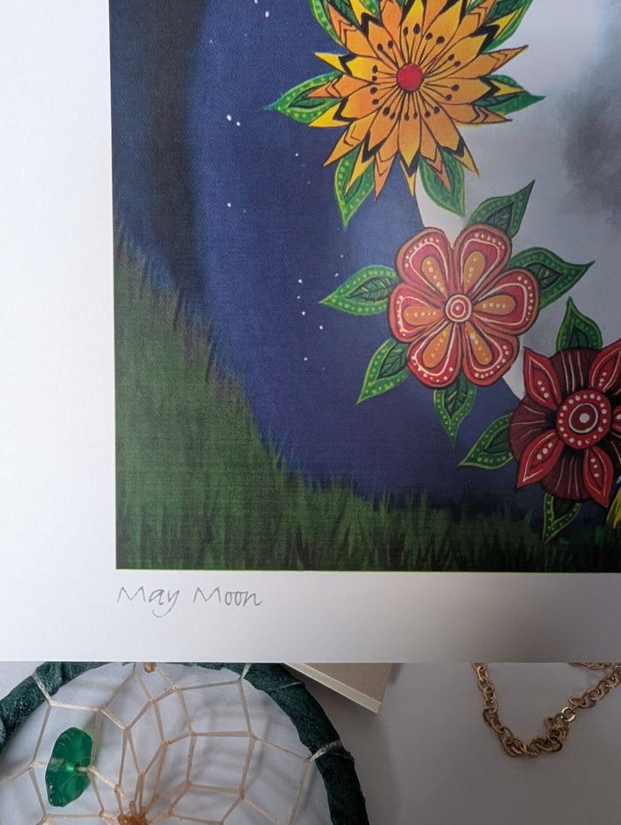 close up of may moon card