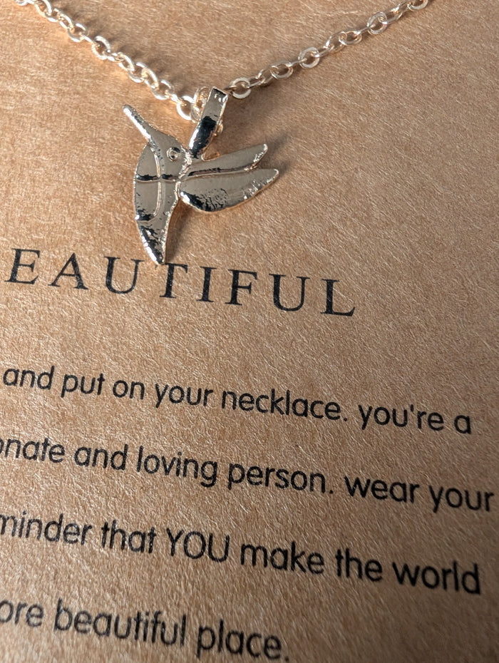 gold coloured hummingbird necklace