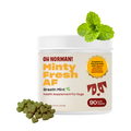 Front view of Minty Fresh AF breath mint jar for dogs, 90 chews, with mint leaves and heart chews on white