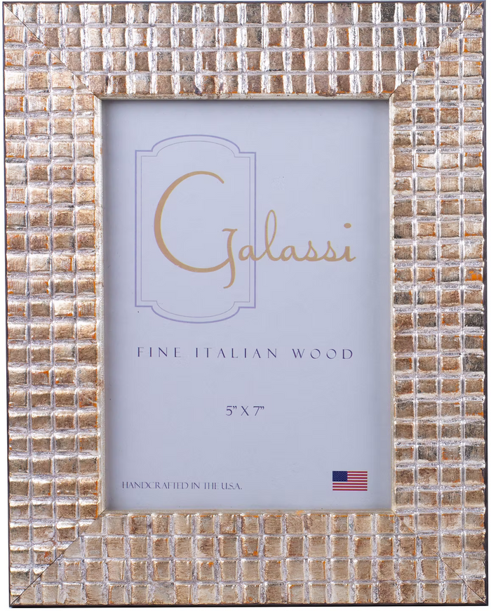 A 5x7 picture frame made of small square mosaic tiles in warm metallic gold, bronze, and silver tones, with a Galassi brand insert card visible in the center.